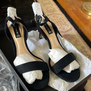 Beautiful Black suede heels. Never worn boxed completely protected size 8